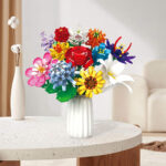 لگو طرح گل با گلدان مدل Flowers Clusters کد 11053، تعداد 1064 قطعه، 12 شاخه گل و گلدان همراه با شاخه گل رز و آفتابگردان